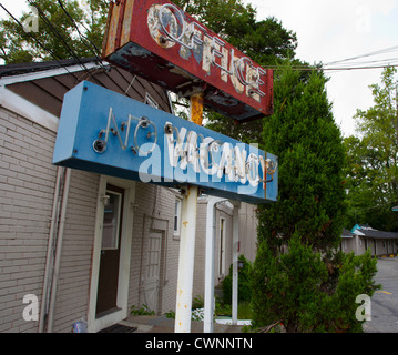 An old sign in front of a motel Stock Photo