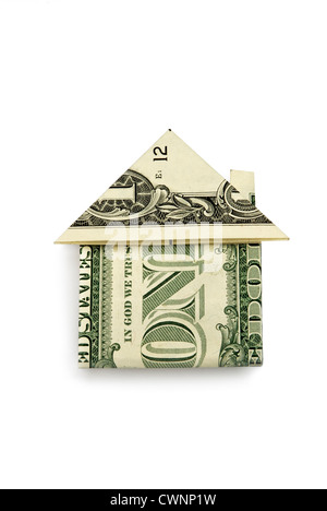 House folded from a dollar bill, isolated on 100% white background Stock Photo