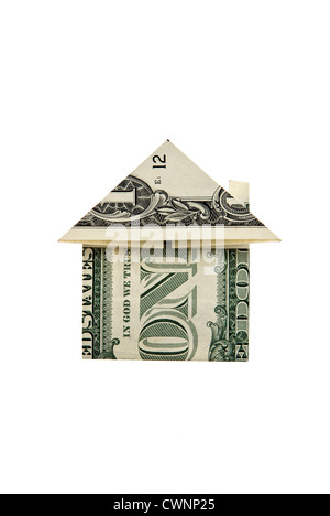 House folded from a dollar bill, isolated on 100% white background Stock Photo