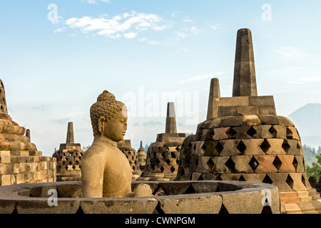 Buddha statue inside one of Borobudur temple stupas, Java island, Indonesia Stock Photo