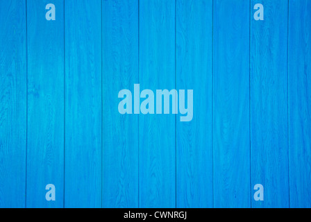 Wooden wall painted bright blue Stock Photo