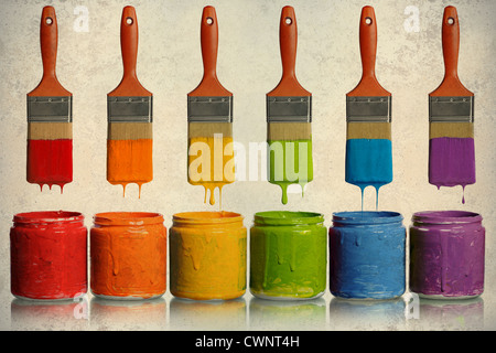 Grunge poster with paintbrushes dripping paint of various colors into containers Stock Photo