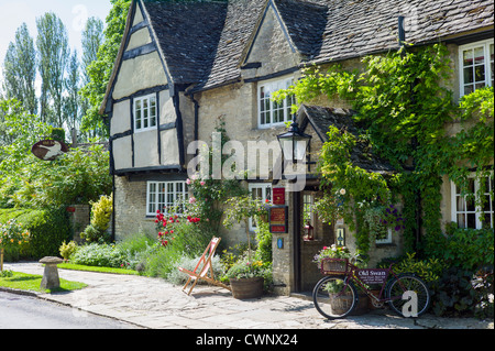The Old Swan Hotel and Public House in Minster Lovell in The Cotswolds, Oxfordshire, UK Stock Photo