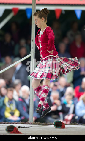 Highland dancers compete in the Highland Games of the Braemar Gathering in Aberdenshire, Scotland Stock Photo