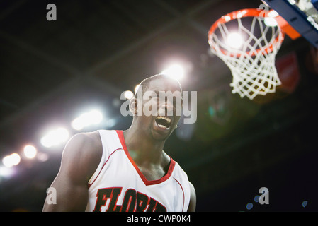 Basketball player shouting Stock Photo