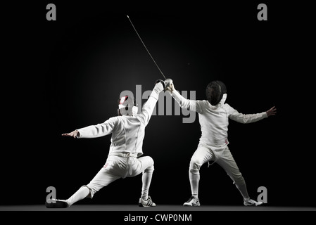 Fencers fencing Stock Photo