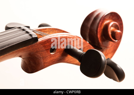 closeup of a violin scroll and pegbox Stock Photo