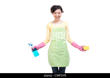 Happy housewife and cleaning products Stock Photo