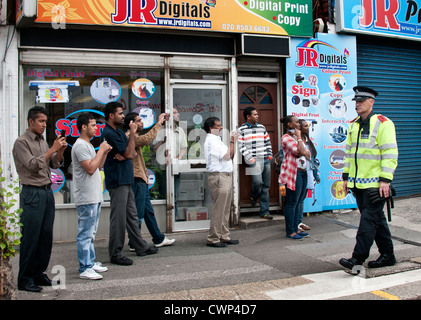 Multicultural street scenes in Walthamstow North London Stock Photo