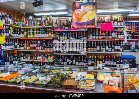 Paris, France, Shops in French Farmer's Market, Covered Hall, 'Marché Saint Quentin', Delicatessen, with Shelves of Wine Bottles on Display, inside view of supermarket Stock Photo