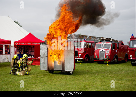 Essex County Fire and Rescue Service - A demonstration by Essex Fire Service of a chip pan fire at the Orsett Show in Essex Stock Photo