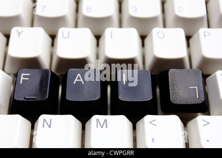 conceptual image: he word FAIL in black letters on a white keyboard, with the letter L upside down Stock Photo