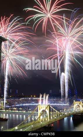 Firework celebration above PNC Park and Roberto Clemente Bridge in Pittsburgh, Pennsylvania. Stock Photo