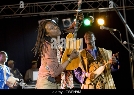 Malian musician Habib Koite on stage with Bassekou Kouyate at the 'festival au Desert' near Timbuktu, Mali Stock Photo