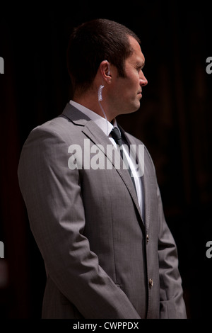 A personal protection officer checking out the vicinity Stock Photo