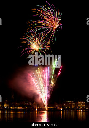 Fireworks above Binnenalster lake at hamburg on occasion of Alstervergnuegen festival Stock Photo