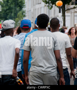 Group of West Indian youths in West London street Stock Photo