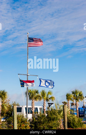 Flags at visitor's center on Bald Head Island, North Carolina. Stock Photo