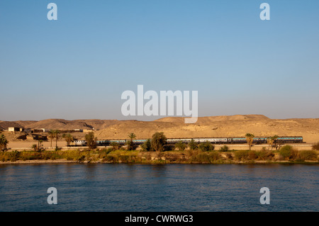 Train in Upper Egypt, Nile river countryside between Luxor and Aswan Stock Photo
