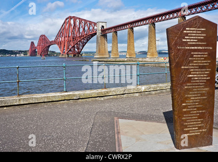 The iconic Forth Rail bridge viewed from the South Queensferry promenade with newly erected memorial right Stock Photo