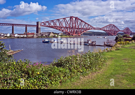 The famous Forth Rail Bridge linking North Queensferry with South Queensferry to the south as seen from North Queensferry. Stock Photo