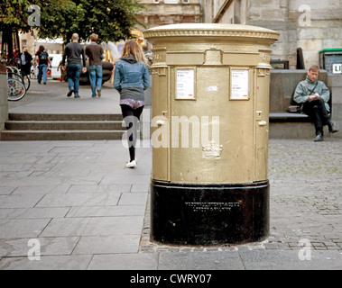 Gold-painted double post box in Hunter Square Edinburgh, one of two honouring Sir Chris Hoy's Olympic Gold Medal, London 2012, Scotland Stock Photo