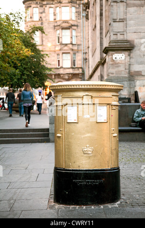 Gold-painted post box in Hunter Square Edinburgh, one of two honouring Sir Chris Hoy's Olympic Gold Medal, London 2012, Scotland Stock Photo