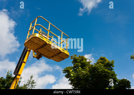 An empty cherry picker high access platform. Stock Photo