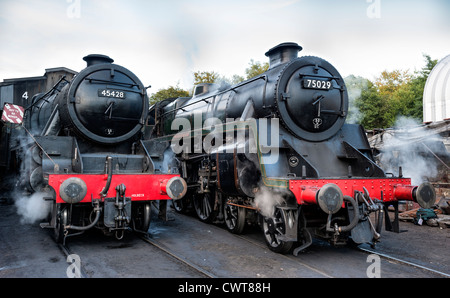 Steam engines Eric Treacy and the Green Knight Grosmont engine sheds on the North Yorkshire Moors railway Stock Photo