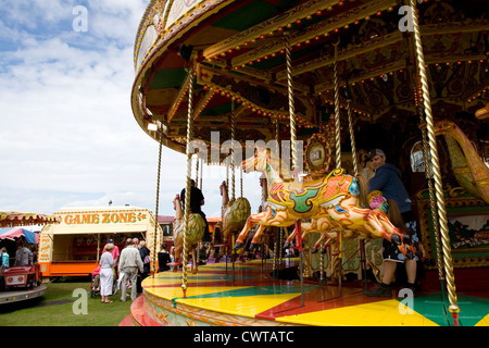 Merry-Go-Round Horses, Tankerton Fun Fair, Whitstable, Kent, England, UK Stock Photo