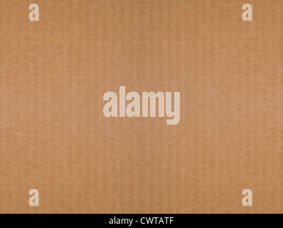 Seamless, tileable, brown, corrugated cardboard background. Recycled material. Stock Photo