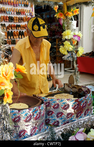 Man making fresh pancakes at a stall in Sousse Medina, Tunisia, North AFrica Stock Photo
