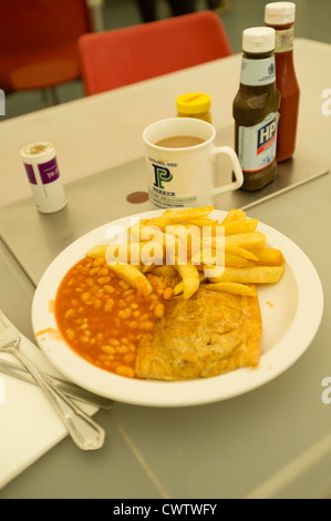 A plate of pasty chips and beans at a greasy spoon truckers cafe, UK Stock Photo