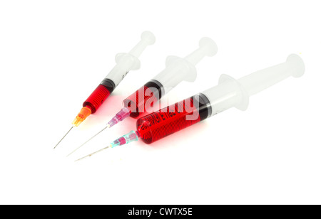Three syringe against white background Stock Photo