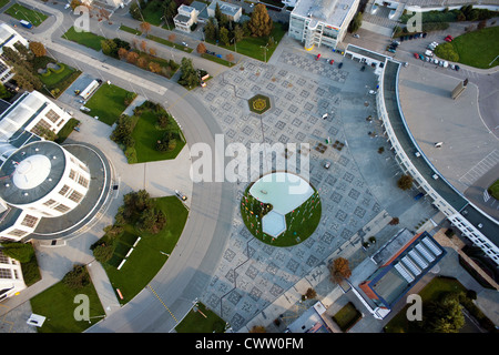 Highly detailed aerial city view with crossroads, roads, factories, houses, parks, parking lots, exhibition grounds Stock Photo