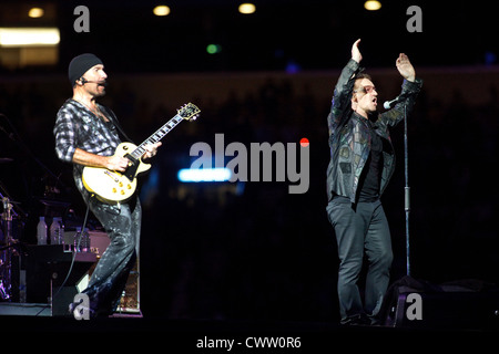 The Edge and Bono performing during The U2 360° Tour Stock Photo