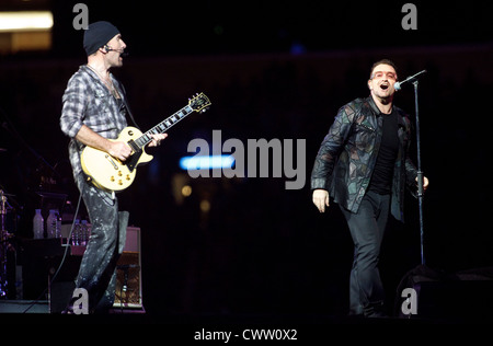 The Edge and Bono performing during The U2 360° Tour Stock Photo