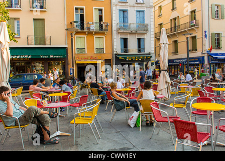 Perpignan, France, Medium Crowd People, Sharing drinks in French Bistro, Cafe, Exterior Restaurant, sidewalk terrace, tables, street scene Stock Photo