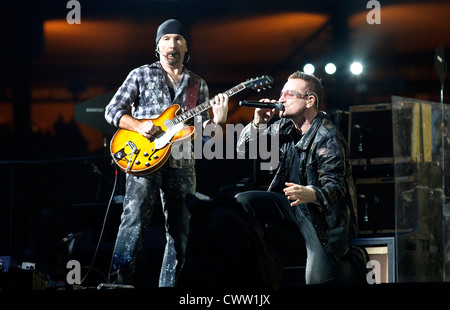 The Edge and Bono performing during The U2 360° Tour Stock Photo