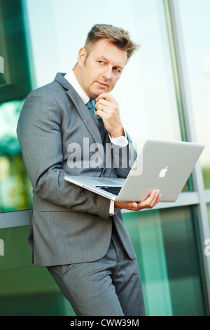 Thoughtful businessman Stock Photo