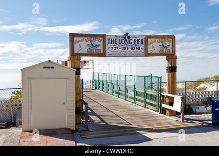 Signs at entrance to the Long Pier fishing pier on the Gulf Coast at ...