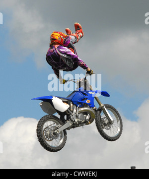 Motor cycles jumping ramps to heights of 35 feet Stock Photo