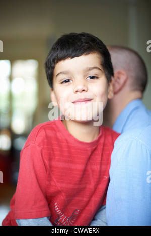 Close up of father carrying son Stock Photo