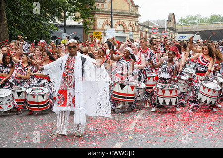 Notting Hill Carnival in London, group Batala with conductor Stock Photo