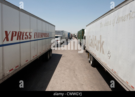 commercial port along the Texas southwest. U.S Customs and Border Protection officers check trucks for possible hidden drugs Stock Photo