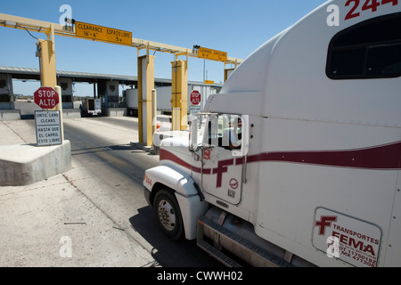 commercial port along the Texas southwest. U.S Customs and Border Protection officers check trucks for possible hidden drugs Stock Photo