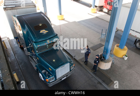 commercial port along the Texas southwest. U.S Customs and Border Protection officers check trucks for possible hidden drugs Stock Photo