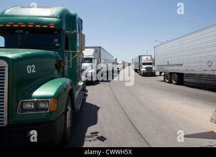 commercial port along the Texas southwest. U.S Customs and Border Protection officers check trucks for possible hidden drugs Stock Photo