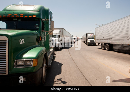 commercial port along the Texas southwest. U.S Customs and Border Protection officers check trucks for possible hidden drugs Stock Photo