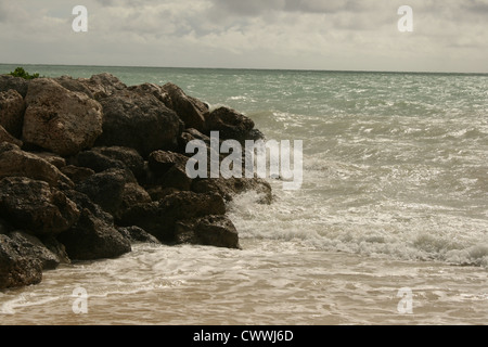 Grand Bahamas freeport seascape surf art waves crashing on rocks on shore Stock Photo